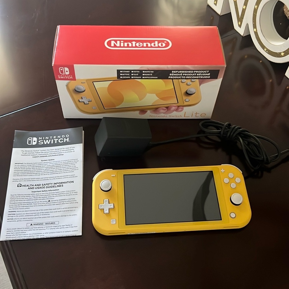 🎮 Nintendo Switch Lite - Yellow 🎮  Get ready for gaming on-the-go!